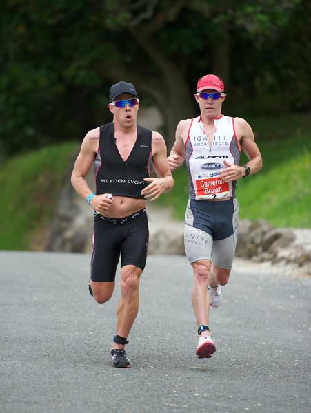 Protagonists Callum Millward and winner Cameron Brown battle it out on the run at the Port of Tauranga Half at Mount Maunganui today
